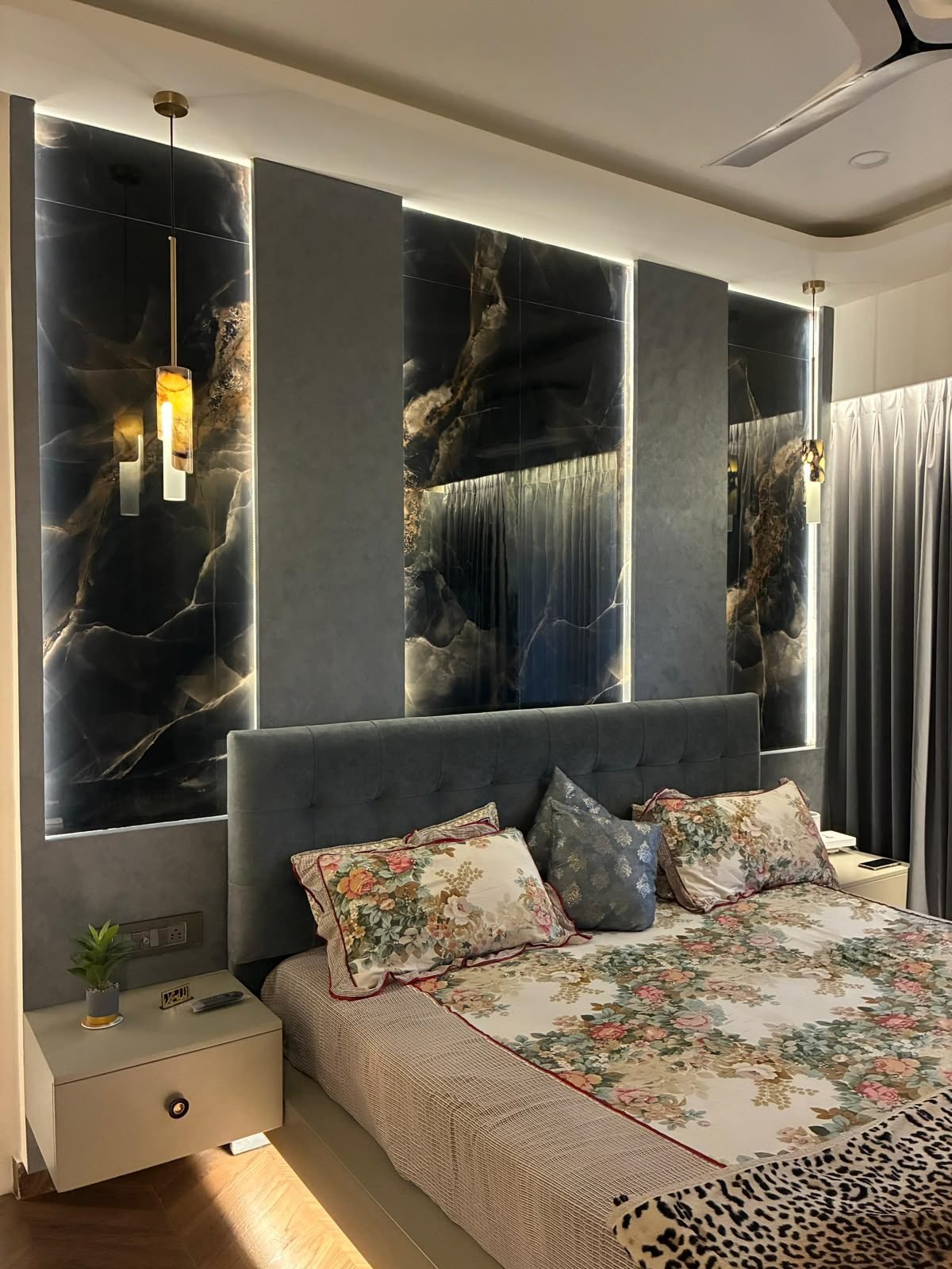 Bedroom with backlit stone panels